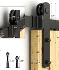 Close-up of 6.6 Foot Sliding Barn Door Hardware Kit with metal rollers and bolts for 35 to 40 inch wooden door installation.