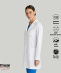 Woman wearing Women's 3 Pocket Lab Coat 32 Inch White 3X Large Soft Touch Fabric tailored for nurses with finished seams.