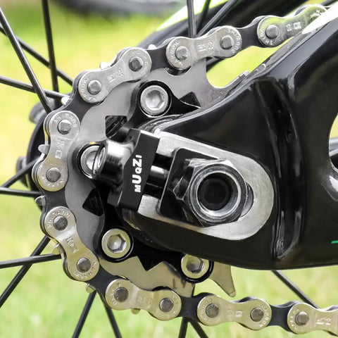 Close-up of black aluminum Two Pack Single Speed Bicycle Chain Tensioner Adjuster Regulator For BMX Fixed Gear Bikes on bike