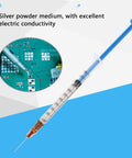 Syringe of Conductive Silver Paste For Electronics Repair And Soldering, shown with PCB for high conductivity DIY use, 0.7ml