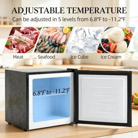 Adjustable thermostat dial on Black Compact Upright Mini Freezer 1.1 Cu Ft shows temperature range 6.8°F to -11.2°F.