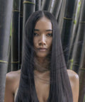 Person with long, straight hair in bamboo forest, Go-To Detangling Cream Rinse For Dry Damaged Color Treated Hair With Awapuhi And KeraTriplex, Strengthens And Repairs Each Strand, Color Safe Daily Conditioner, 2.5 Fl Oz