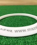 All Direction Putting Cup Ring Indoor Golf Practice Hole Trainer on green mat showing website URL