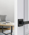 Heavy Duty Reversible Dummy Door Lever Square Door Handle For Indoor Use Rear Mount Matte Black 5 Pack on a white door
