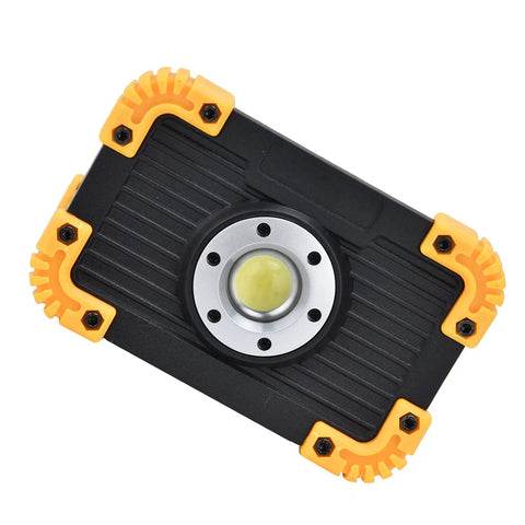 YWBL-WH Mini COB Emergency Flood Light, 6-Angle Adjustable Stand top view with yellow accents and durable black housing.