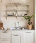 Champagne Bronze Reeded Cabinet Pulls Six Pack 5 Inch Sleek Modern Textured Drawer Handles in a kitchen setting
