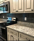Gray White Black Granite Marble Look Vinyl Countertop Wrap Peel And Stick Waterproof Scratch And Heat Resistant Roll 36 By 120 Inches Removable Wallpaper installed on kitchen countertops and backsplash.