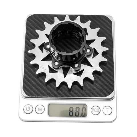 Dope Single Speed Conversion Kit 13T To 22T Cogs With 17T Cassette And Spacers on scale showing 88 grams