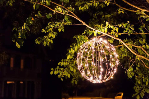 16 Inch LED Light Ball For Indoor And Outdoor Use With Warm White Lights Waterproof And Durable Lightweight Holiday Decor For Patio Or Wedding Displays Fold Flat Metal Frame For Easy Storage hanging from tree branch