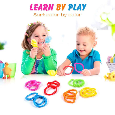 Children playing with Link To Go Baby Rings Toy Kit For Stroller Car Seat Crib Clip On Play Mat Early Education Set