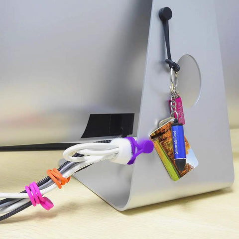 Reusable Silicone Magnetic Cable Ties For Organizing Cables Bundling Wires And Quick DIY Fixes in use on computer cables