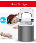 Countertop Ice Maker Machine With Premium Stainless Steel Body And Black Viewing Lid in silent operation near sleeping baby.