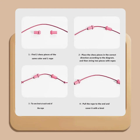 Rope Untangling Puzzle Game For Kids And Adults, Educational Strategy Board Game instructions with pink ropes on wooden board.