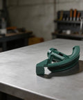 Heavy Duty Carbon Steel Conduit Bender Head For Manual Pipe Bending Works With Copper Aluminum And Gas Installations 5/8 Inch Size Ergonomic Grip on metal table.