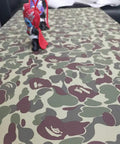 Table with green camouflage peel and stick vinyl contact paper for walls cabinets shelves dresser drawers and furniture decals