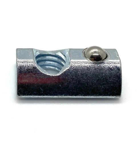 Close-up of Roll-In T-Nut With Ball Spring 5/16-18 for 15 Series Aluminum Extrusion, showing ball-spring mechanism.