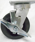 Heavy Duty Kingpinless Swivel Casters With Brakes Six Inch Rubber Tires On Steel Hub toolbox cart wheel close-up view.