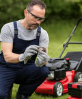 Man holding Two Pack High Precision Thrust Needle Roller Bearings With Washers Bearing Steel Material for lawn mower maintenance