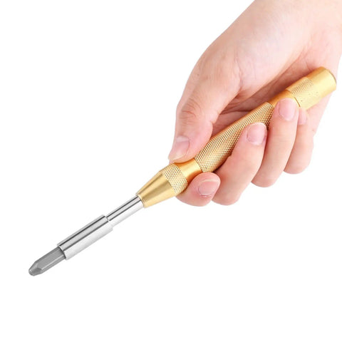 Hand holding punch tool from 38 Piece Automatic Letter And Number Metal Stamping Kit For Leather And Plastic, Embossing Stamp Set