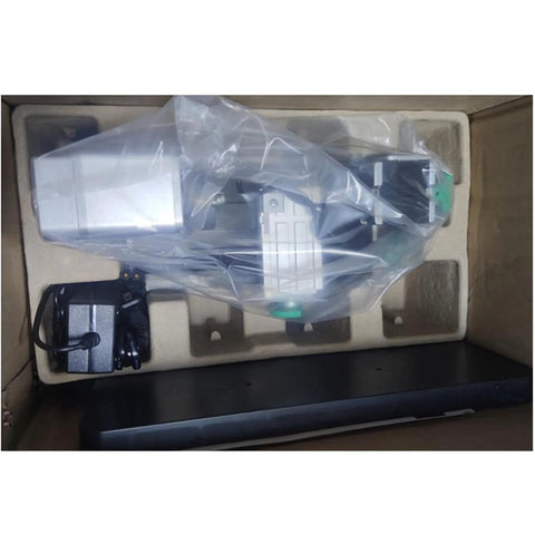 Front view of ZHRUI all-metal miniature lathe in foam packaging with a green adjustment knob