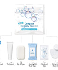 Compact hygiene care kit with toothbrush, toothpaste, bar of soap, cleaning wet body wipe, deodorant wipe, and compressed wash cloth.