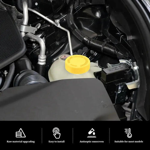 Close-up of a yellow Two Pack Radiator Coolant Reservoir Cap Set Fits Infiniti And Nissan OEM 21712 79900 on engine water tank.