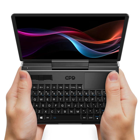 Badass 7 Inch FHD Touchscreen Mini Laptop PC Featuring Intel Core I3 N300 Eight Core Processor With 16GB RAM And 512GB SSD Drive Plus Fast WiFi 6 Hotspot For Daily Grind in hands with FHD display.