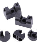 Two black plastic hose holder blocks with deep cradle holes for securing aquarium tubing.