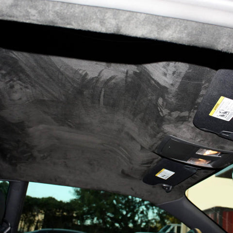 Suede headliner fabric, black, 96x65 inches, installed in car interior