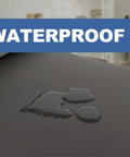 Waterproof feature close-up of Badass Mass Loaded Vinyl Soundproofing Roll surface showing water drops for home studios and garages.