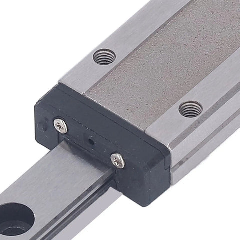 Close-up of Miniature Linear Guide Rail With Bearing Steel Carriage Block 100mm Motion Guide, showing carriage block and screws.