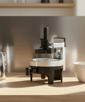 Premium Espresso Coffee Distributor And Tamper Leveler With Adjustable Rotary Depth and Twelve Prongs on kitchen counter.