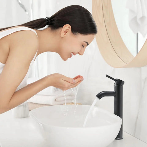 Woman using Chrome Vessel Sink Faucet Tall Modern Design With Single Handle One Hole Mount For Vanity Lavatory RV Bathroom