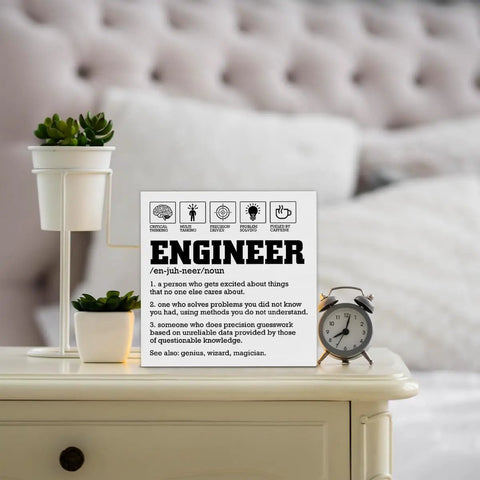 Engineer Definition Wooden Box Sign Decor For Home And Office, 5x5 Inch Wall Art And Shelf Decor, on a nightstand with plants and clock.