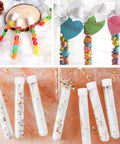 Image of 50 Pcs Clear Plastic Test Tubes With Rack And Caps, 16x100mm 10ml Capacity, filled with candies and decor items.