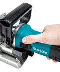 Close-up of a person using a Plate Joiner For Quick, Precise Biscuit Joinery With Five Point Six Amp Motor And Eleven Thousand RPM.