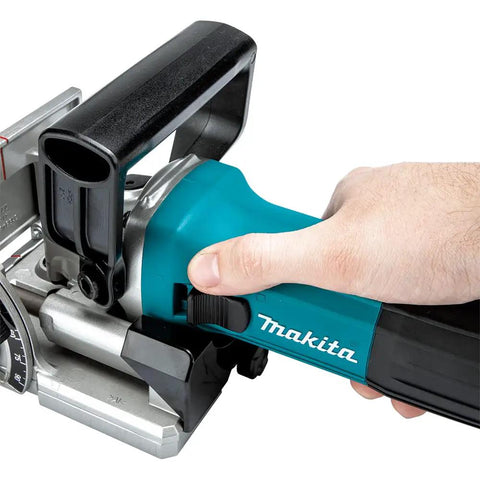 Close-up of a person using a Plate Joiner For Quick, Precise Biscuit Joinery With Five Point Six Amp Motor And Eleven Thousand RPM.