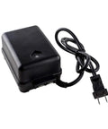Black power adapter for Outdoor Bollard Lighting Kit with cable and plug, essential for setup and use.