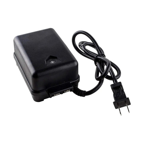 Black power adapter for Outdoor Bollard Lighting Kit with cable and plug, essential for setup and use.