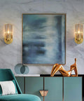 Super Sleek Modern Copper Brass Wall Sconce With Geometric Cylindrical Glass Shade For Bedroom Bedside And Living Room E14 Compatible Accent Lamp on a wall next to abstract art.