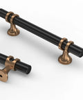 Close-up of matte black cabinet handles with bronze brackets, part of the 30 Pack 5 Inch Matte Black Cabinet Handles For Kitchen Cabinets And Cupboards Durable Black Cabinet Pulls For Drawers And Doors Easy Install Modern Look With Smooth Finish Great Value.