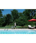 Man using Go To Outdoor Mist Cooling Fan With 18 Inch Blade, 5 Speed Settings by poolside