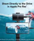 2TB Portable SSD SL500 USB 3.2 Gen 2x2 capturing 4K video from iPhone 15, connected for fast storage, featuring sleek design.