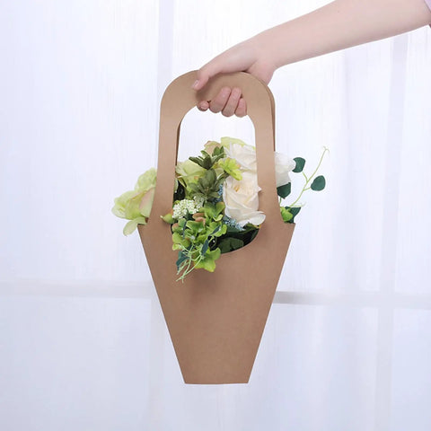 Hand holding 50 Pack Kraft Paper Flower Gift Bags Brown Hanging Bouquet Wrapping Bags For Home Decoration Durable 7.5 By 35 Cm 2.9 By 13.8 In