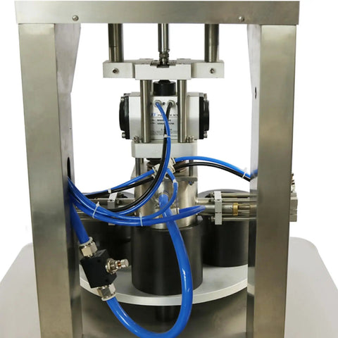 Heavy Duty Vacuum Capper For Glass Jars And Tin Cans With Adjustable 30 To 80 Mm Jaw, stainless steel machine with blue hoses.
