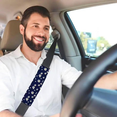 Man driving with 10 Pack Sublimation Blank Car Seat Belt Pad Covers Neoprene DIY Heat Transfer Cushions for Auto Interiors.