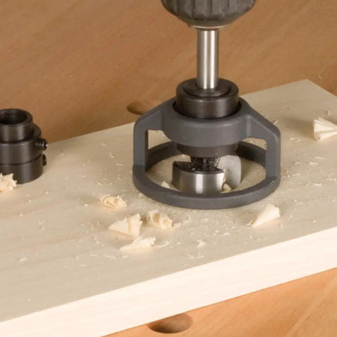 Top Shelf High Speed Steel Forstner Bit Set With Adjustable Depth Stop Collar drilling into wood with shavings around.
