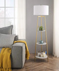 Dope Modern Floor Lamp With Faux Marble Shelves And Fabric Shade next to gray couch in living room, showcasing tall sleek design.