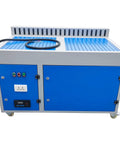 Heavy Duty Metalworking Downdraft Table Dust Collector With Side Suction For Shop Fine Dust Capture And Multi Stage Filtration That Straight Up Kicks Serious Workshop Mess To The Curb Effortlessly, featuring blue cabinets and perforated worktop.