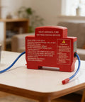 Built Like A Tank Automatic Fire Extinguisher With Dual Nozzles And Advanced Heat Aerosol Technology Featuring Smart Temp Sensing on a tabletop.